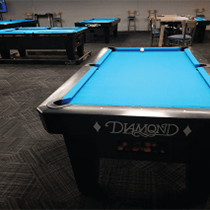 Open space and shot lanes between Diamond tables at Brothers Billiards